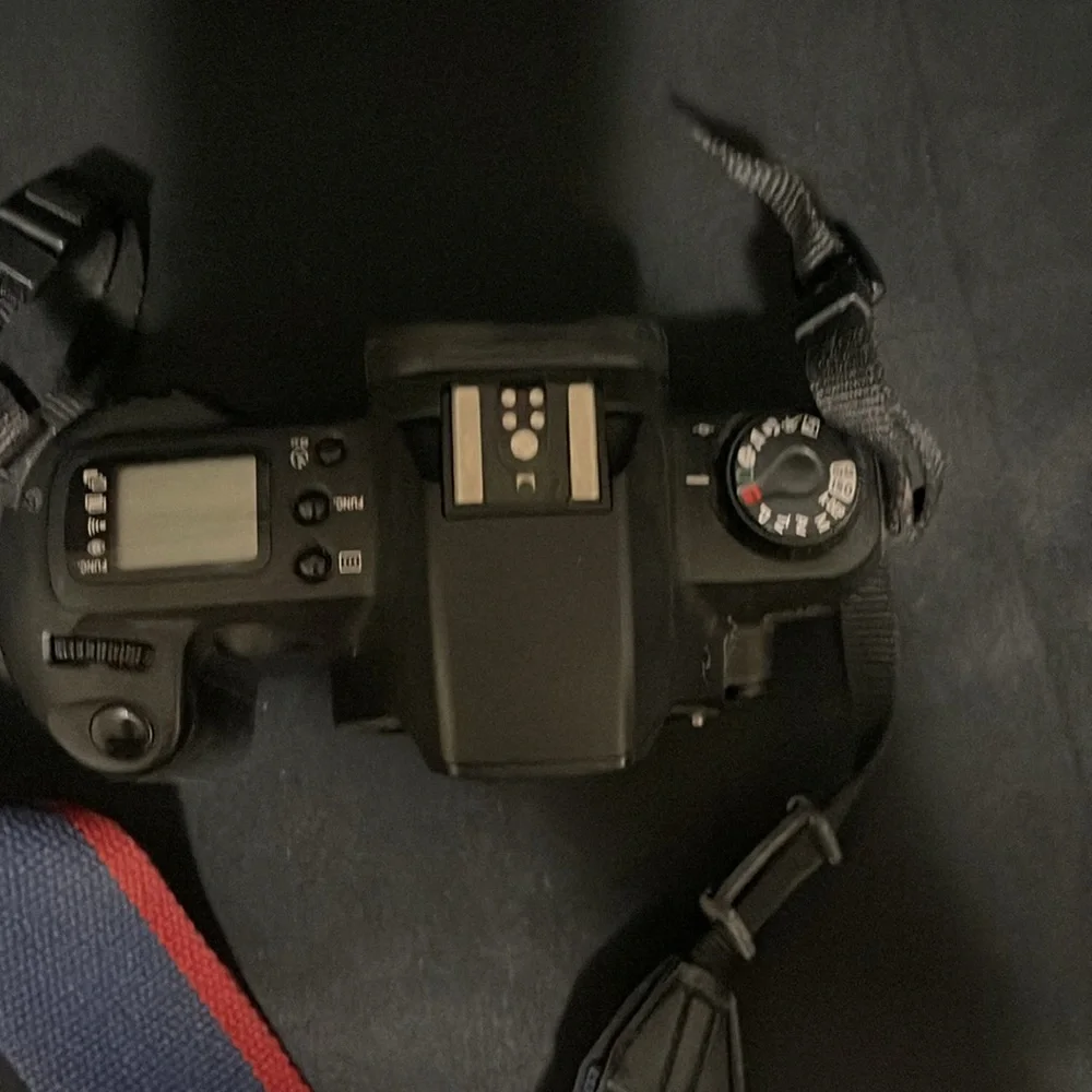 Canon EOS Revel G 35mm film camera with case.